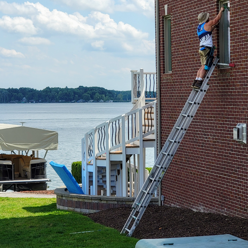 an image that shows Squeegee bros at work.