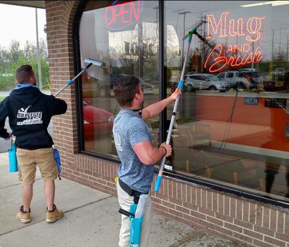 an image that shows Squeegee Bros window cleaning